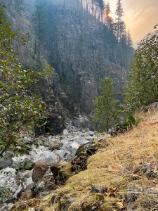 The exposed gravel of the Skagit riverbed between Gorge dam and powerhouse extends beneath smoky skies and in early October 2022. 